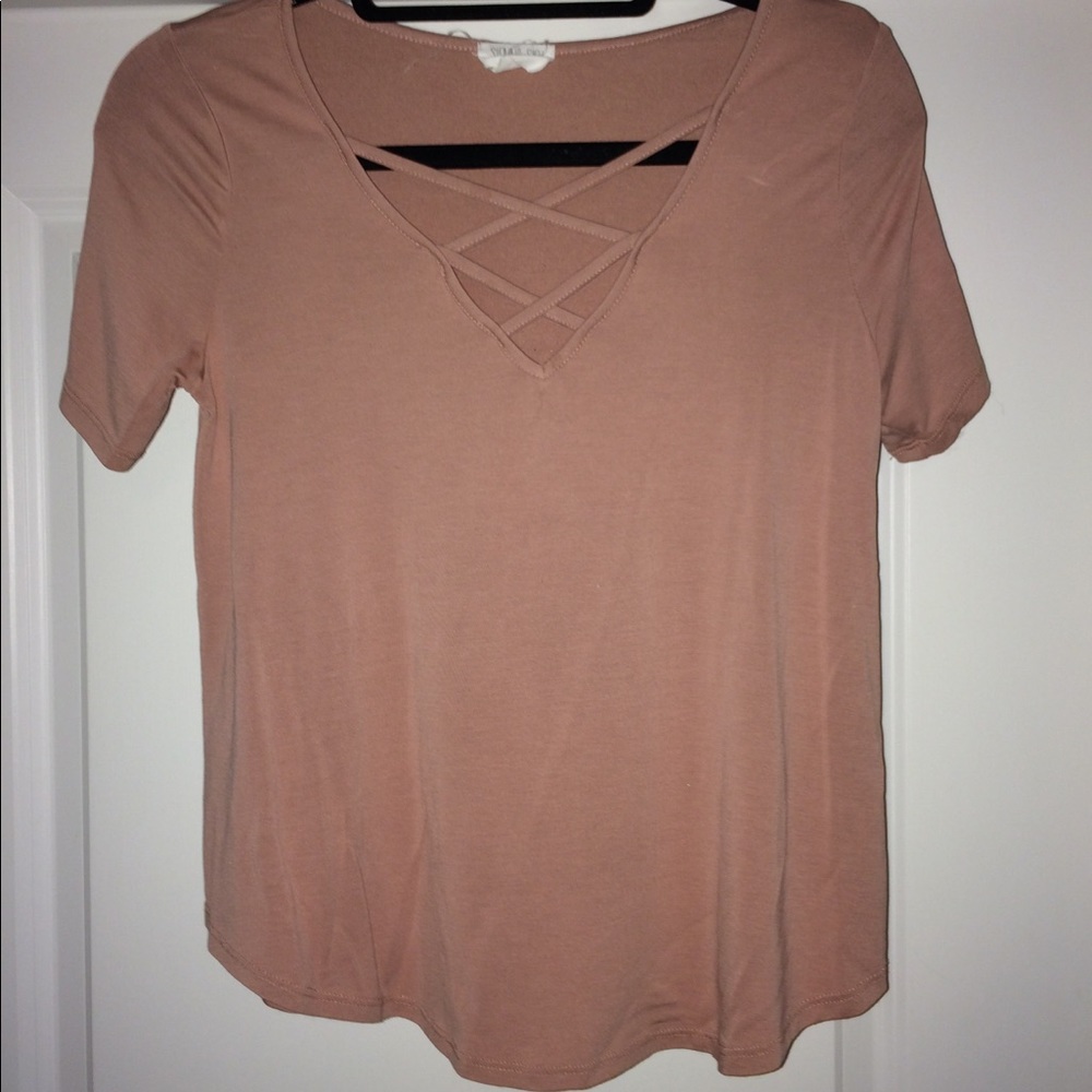 millennial pink t shirt with crossing chest